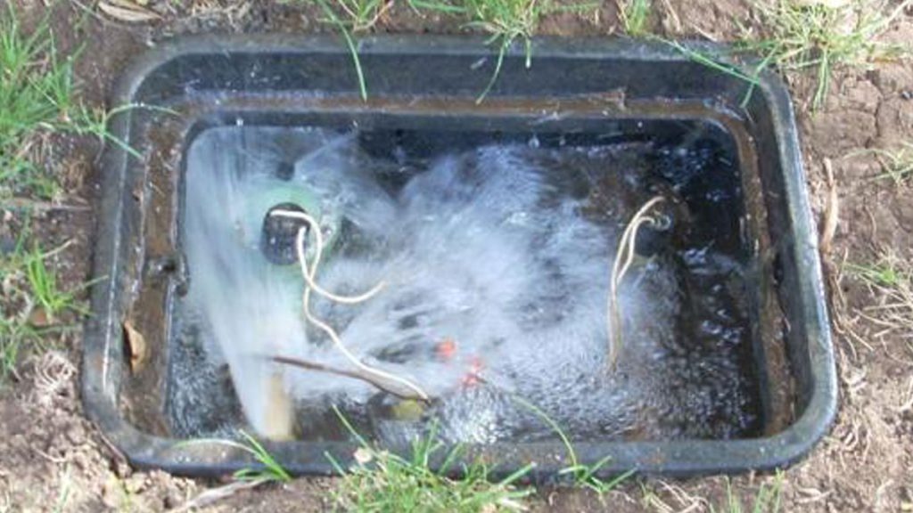 Flooded sprinkler valve box in Grosse Pointe